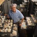 An image of Dr. James W. Porter standing among the GMNH's shell collection.